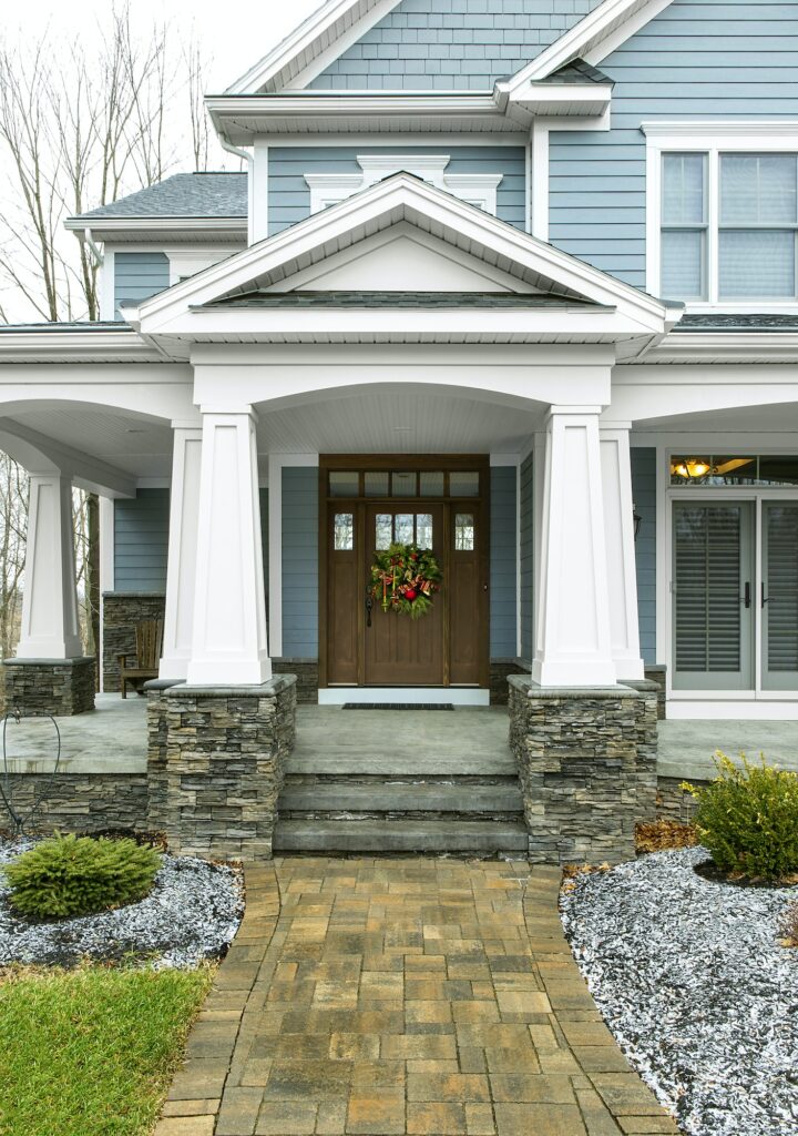 55231,Christmas wreath on front door of house