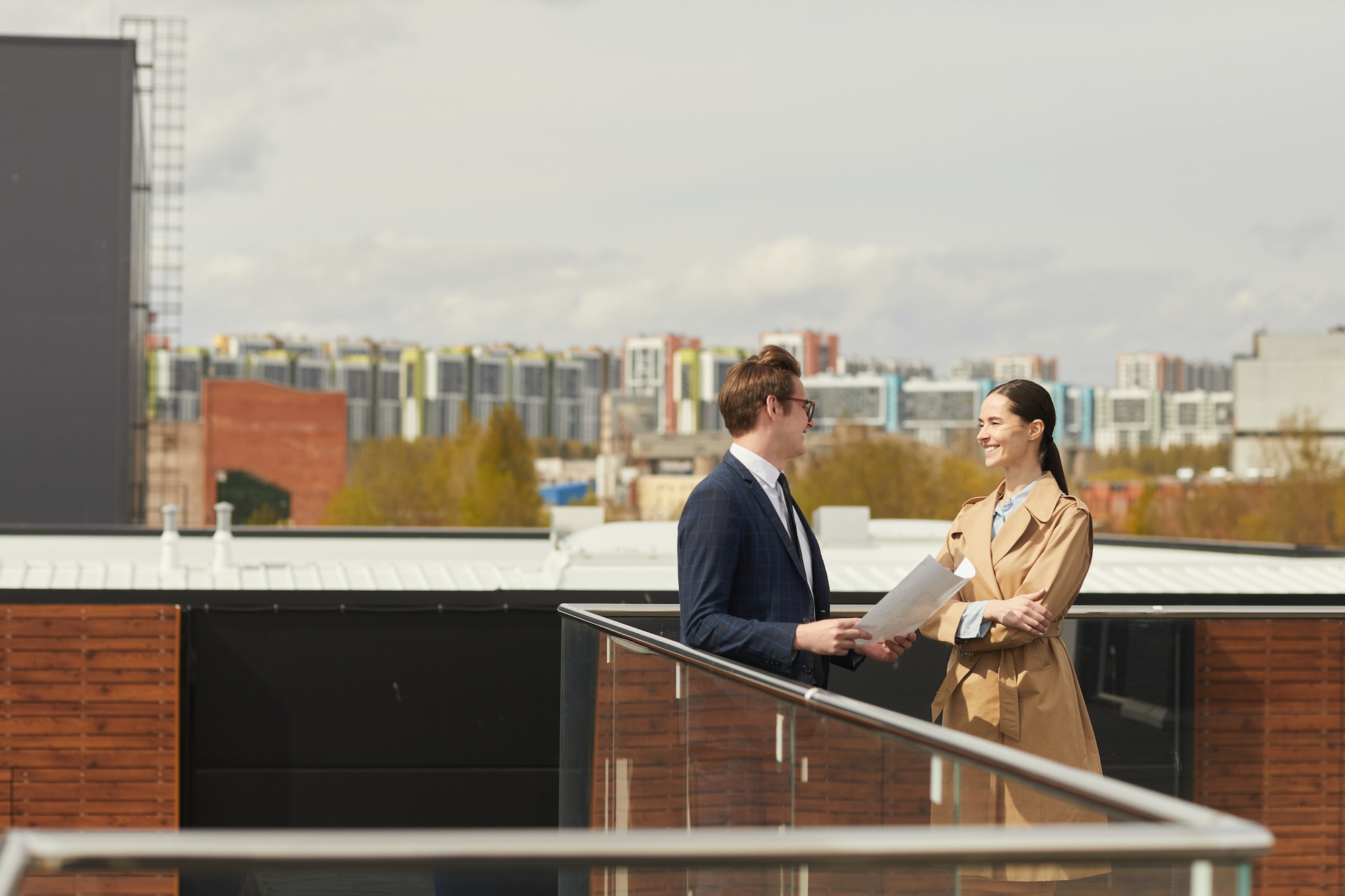 Young Business People on Roof